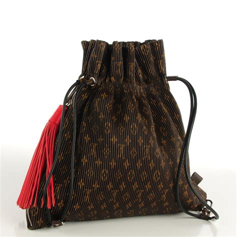 pleated lv retired bag.